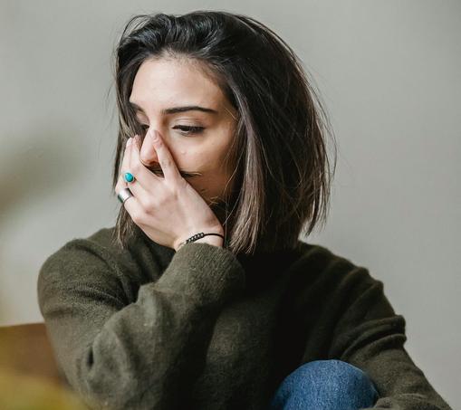 Woman looking worried and sad